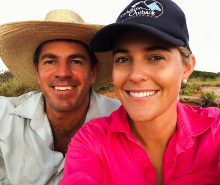 Tom and Annabel Curtain with hats on in the outback smiling at the camera